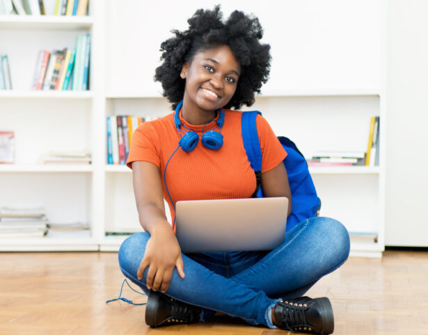 female student learning online at computer